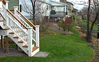 After rebuilding their deck, the clients wanted to step down onto something other than damp grass!