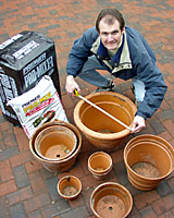 Large containers and hanging baskets are key to success with potted annuals.